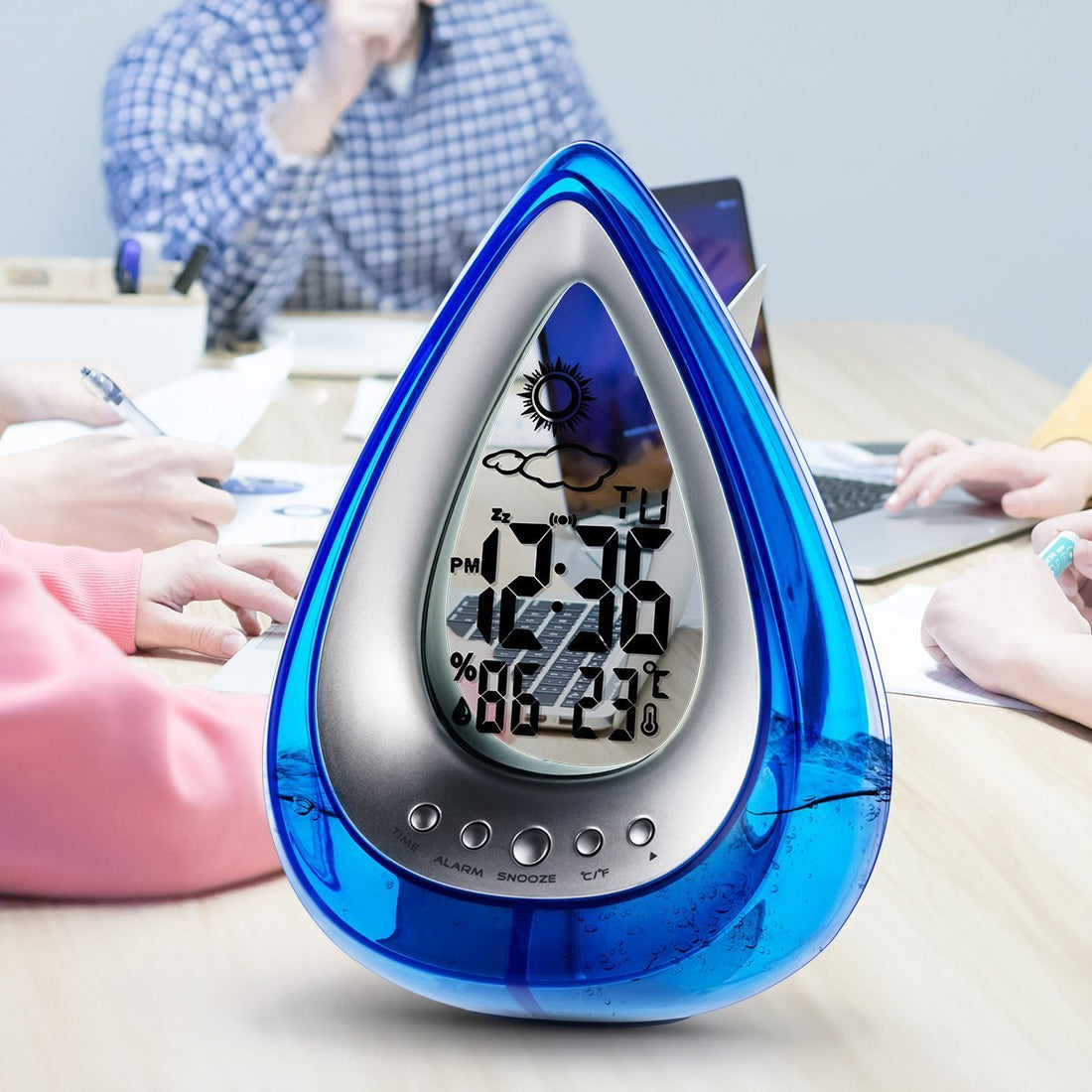 Drop Shaped Digital Alarm Clock on a nightstand